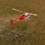 Helicopter Hovering over Long Grass