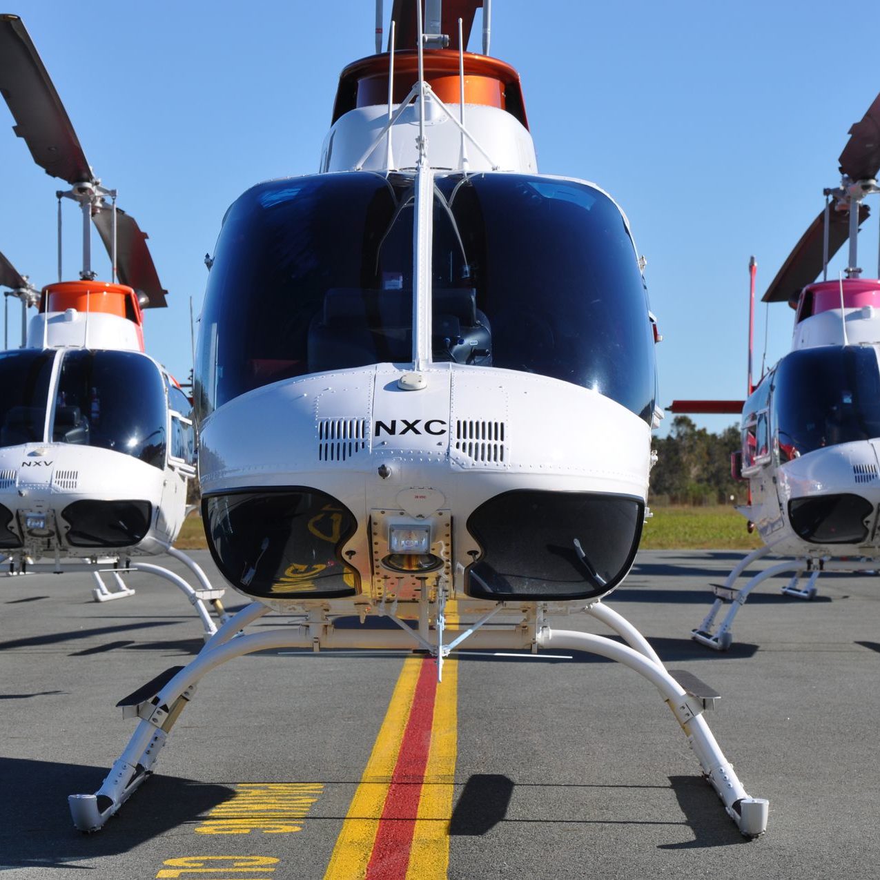 Front view of the B206BIII Jet Ranger fleet in formation