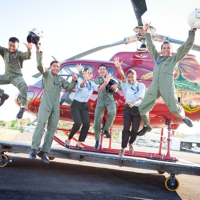 Becker Helicopters pilot trainees jumping from a helicopter for fun